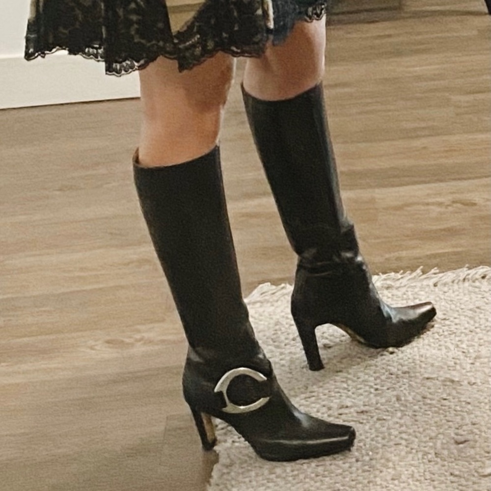 MANOLO BLAHNIK size 38 tall black leather boots with silver detail.